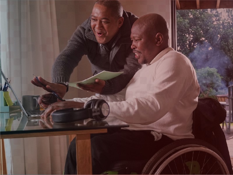 team at warehouse smiling